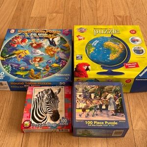 Bundle t of 4 puzzles  all different sizes and designs